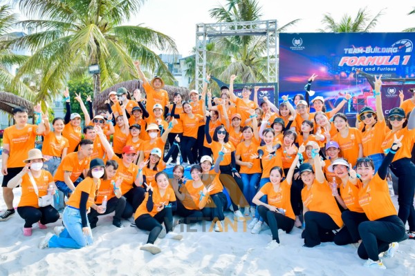 áo đồng phục màu cam teambuilding