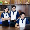 đồng phục công ty màu trắng phối sườn xanh